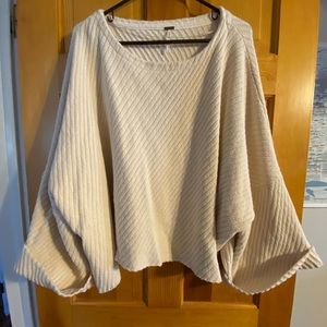 Free People - I can’t wait sweater in a cream color. Size large.